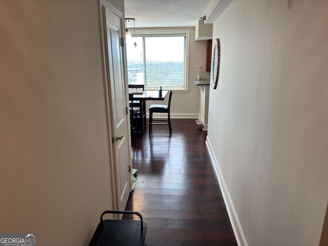2479 Peachtree Rd NE Unit 1714, Atlanta, GA 30305 - corridor with dark wood-type flooring and baseboards