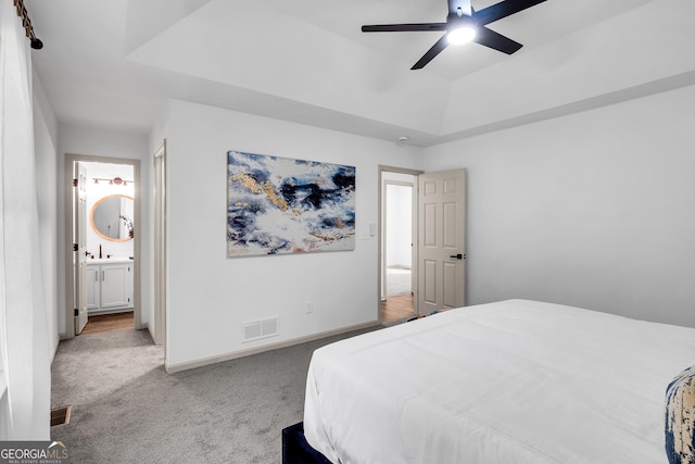 90 Lake Avalon Ct, Dallas, GA 30157 - bedroom featuring light carpet, a raised ceiling, ensuite bathroom, and a ceiling fan