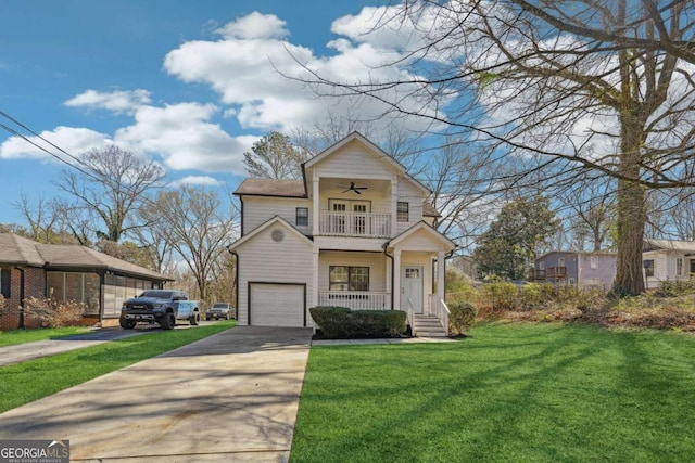 260 Westview Pl SW, Atlanta, GA 30314 - traditional-style house featuring a balcony, ceiling fan, a front lawn, a garage, and driveway