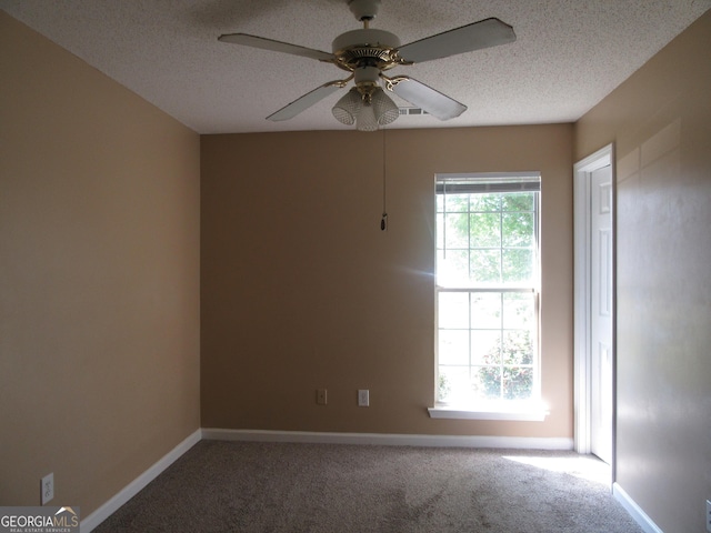 5799 Eagles Feather Ln, Riverdale, GA 30274 - unfurnished room featuring carpet floors, a ceiling fan, and a textured ceiling