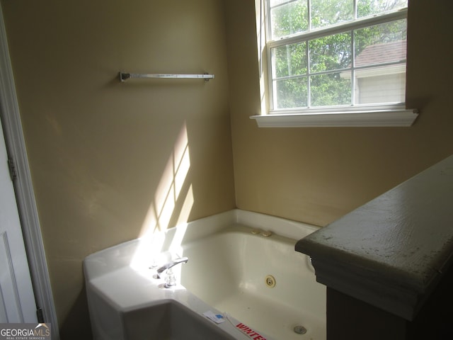 5799 Eagles Feather Ln, Riverdale, GA 30274 - bathroom with a whirlpool tub