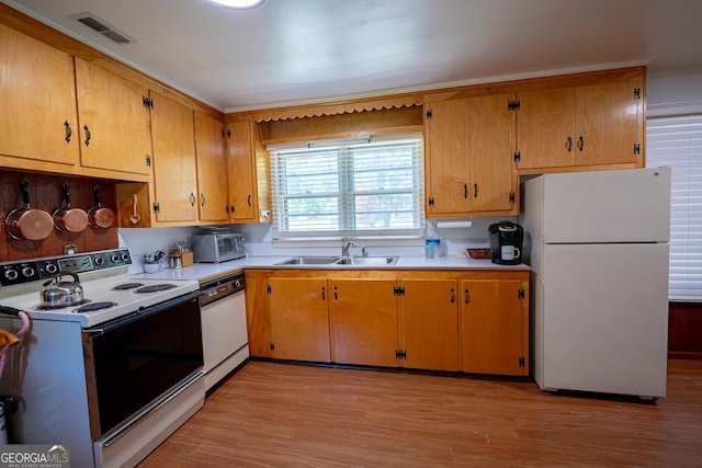 67 Dixie Park Rd NW, Rome, GA 30165 - kitchen featuring white appliances, light countertops, and light wood finished floors