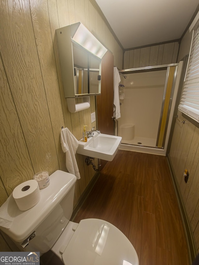 67 Dixie Park Rd NW, Rome, GA 30165 - full bath featuring a shower stall, wooden walls, wood finished floors, and ornamental molding