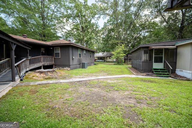 67 Dixie Park Rd NW, Rome, GA 30165 - view of green lawn featuring a sunroom and entry steps