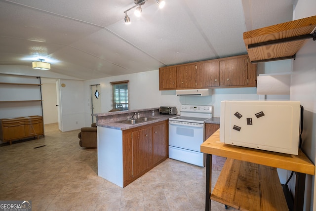 67 Dixie Park Rd NW, Rome, GA 30165 - kitchen with white electric stove, exhaust hood, a peninsula, brown cabinets, and vaulted ceiling