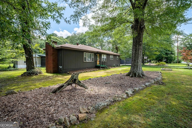 67 Dixie Park Rd NW, Rome, GA 30165 - view of front of property featuring a chimney and a front lawn
