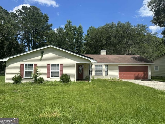 160 Lake Wellington Dr, Kingsland, GA 31548 - ranch-style home featuring concrete driveway, an attached garage, a chimney, and a front yard