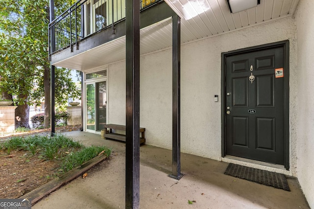 1445 Monroe Dr Unit 14B, Atlanta, GA 30324 - entrance to property featuring stucco siding and a balcony