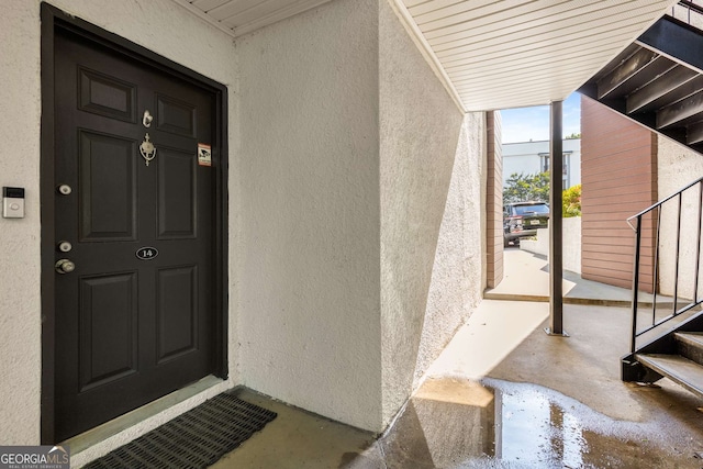 1445 Monroe Dr Unit 14B, Atlanta, GA 30324 - view of exterior entry featuring stucco siding