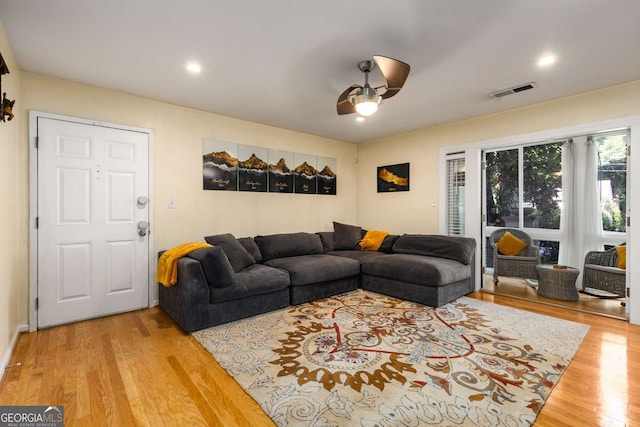 1445 Monroe Dr Unit 14B, Atlanta, GA 30324 - living room with wood finished floors, ceiling fan, and recessed lighting