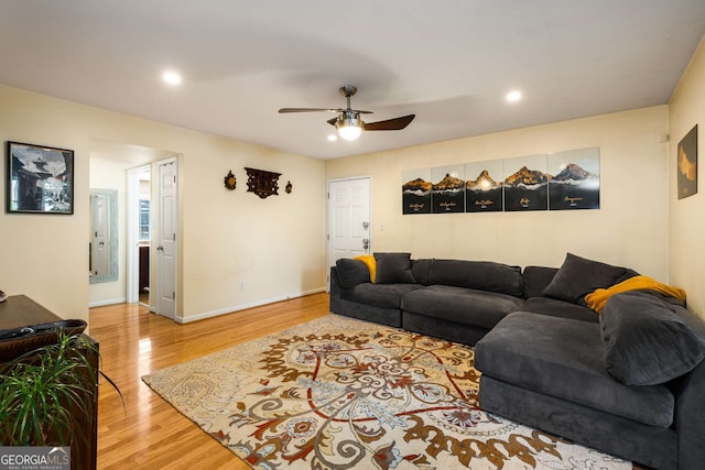 1445 Monroe Dr Unit 14B, Atlanta, GA 30324 - living area with wood finished floors, ceiling fan, and recessed lighting