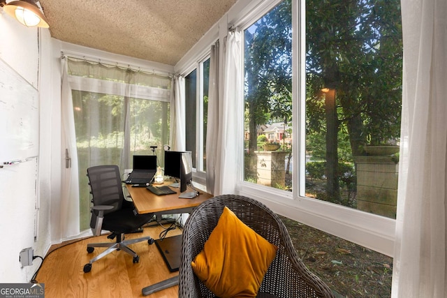 1445 Monroe Dr Unit 14B, Atlanta, GA 30324 - home office featuring wood finished floors and a textured ceiling