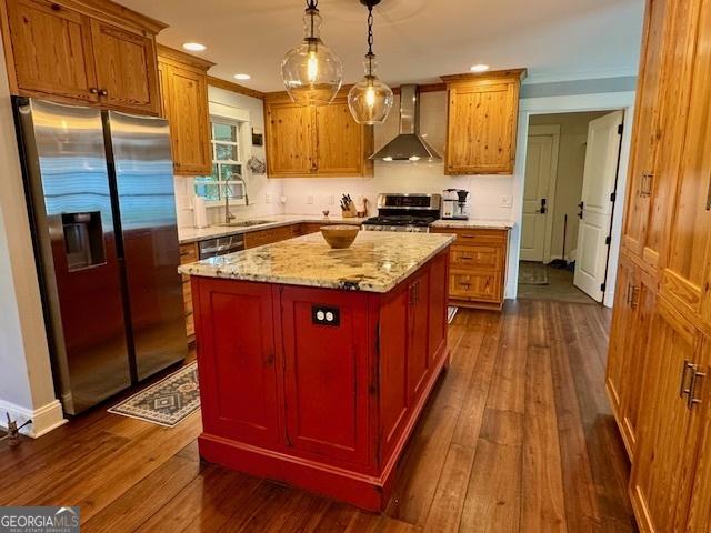 360 Morgan Mill Rd, Brooks, GA 30205 - kitchen with appliances with stainless steel finishes, wall chimney exhaust hood, dark wood finished floors, backsplash, and recessed lighting