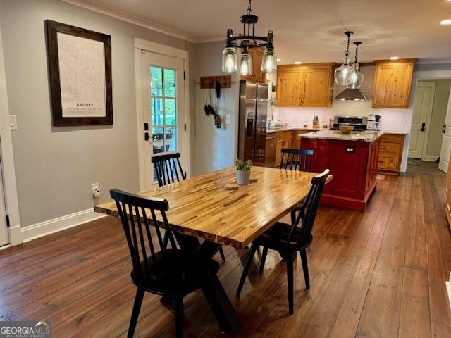 360 Morgan Mill Rd, Brooks, GA 30205 - dining room with dark wood-type flooring, ornamental molding, and recessed lighting