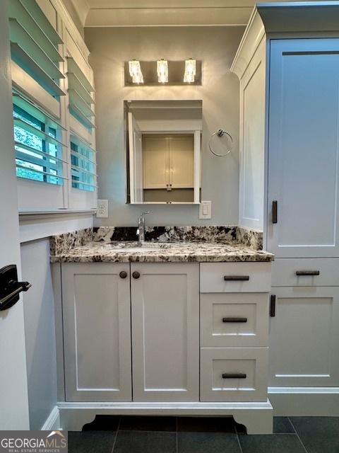360 Morgan Mill Rd, Brooks, GA 30205 - bathroom with vanity and tile patterned flooring