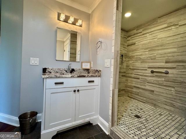 360 Morgan Mill Rd, Brooks, GA 30205 - full bathroom with vanity, a shower stall, tile patterned flooring, and crown molding