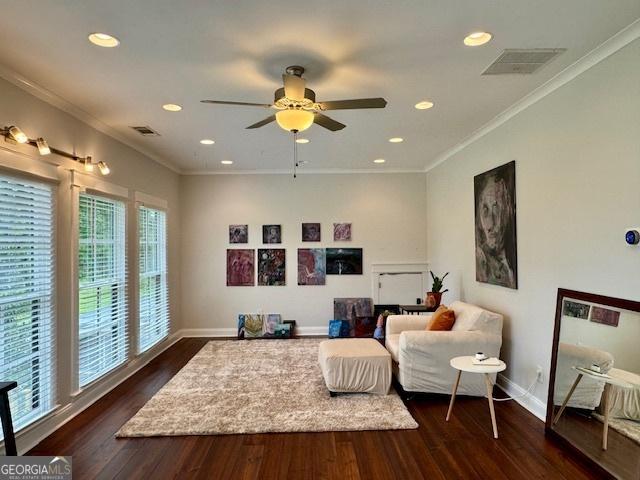 360 Morgan Mill Rd, Brooks, GA 30205 - living area featuring dark wood finished floors, a ceiling fan, recessed lighting, and crown molding
