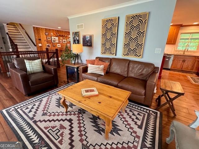 360 Morgan Mill Rd, Brooks, GA 30205 - living area with light wood-style floors, crown molding, and stairway