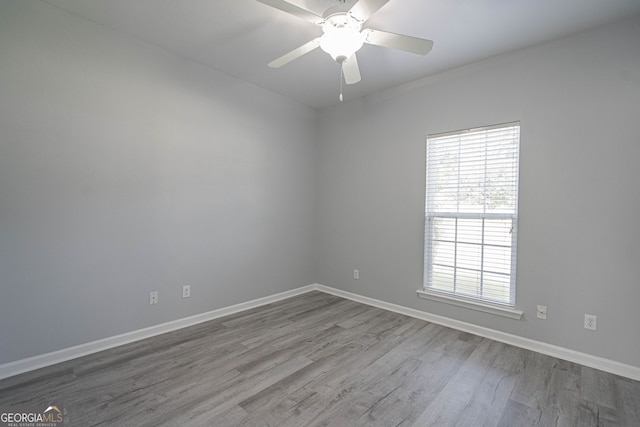 231 Cyane Ln, Guyton, GA 31312 - empty room featuring wood finished floors and a ceiling fan