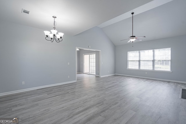 231 Cyane Ln, Guyton, GA 31312 - spare room featuring a ceiling fan, a chandelier, wood finished floors, and high vaulted ceiling