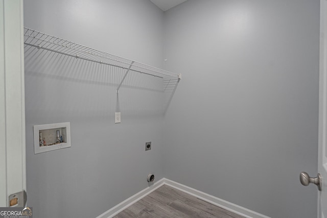231 Cyane Ln, Guyton, GA 31312 - laundry area with washer hookup, hookup for an electric dryer, and wood finished floors