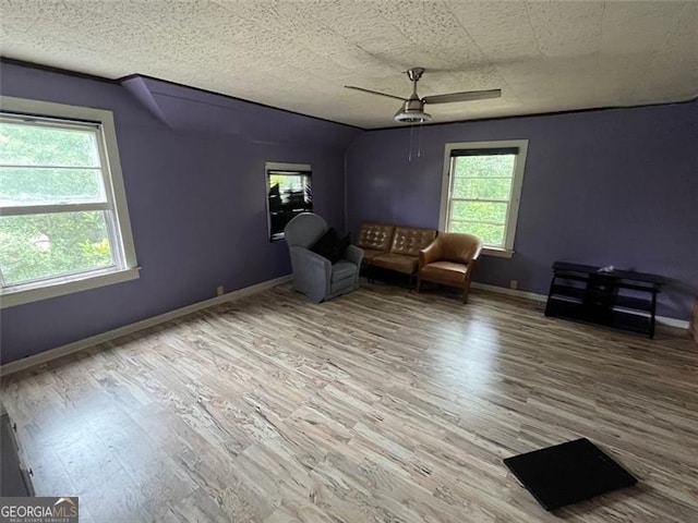 15 Liberty St, Gainesville, GA 30501 - sitting room with ceiling fan and wood finished floors
