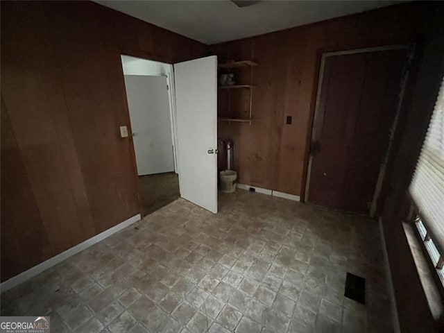 15 Liberty St, Gainesville, GA 30501 - unfurnished bedroom featuring wooden walls