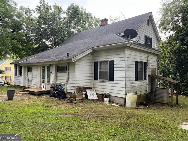 15 Liberty St, Gainesville, GA 30501 - back of house featuring a yard, a chimney, and roof with shingles