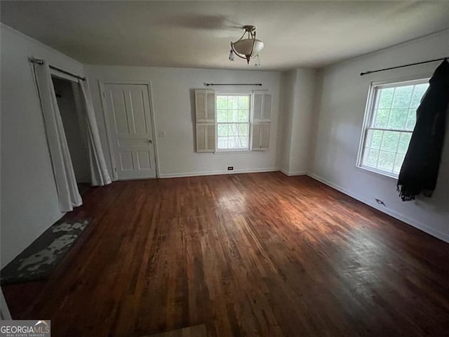 15 Liberty St, Gainesville, GA 30501 - empty room featuring dark wood-style floors and baseboards