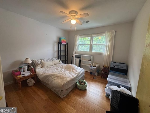 713 Pine Chase, Lawrenceville, GA 30043 - bedroom with wood-type flooring and ceiling fan