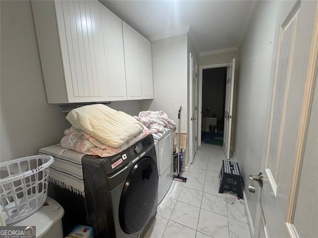 713 Pine Chase, Lawrenceville, GA 30043 - washroom with cabinet space, light marble finish floors, washer / clothes dryer, and crown molding