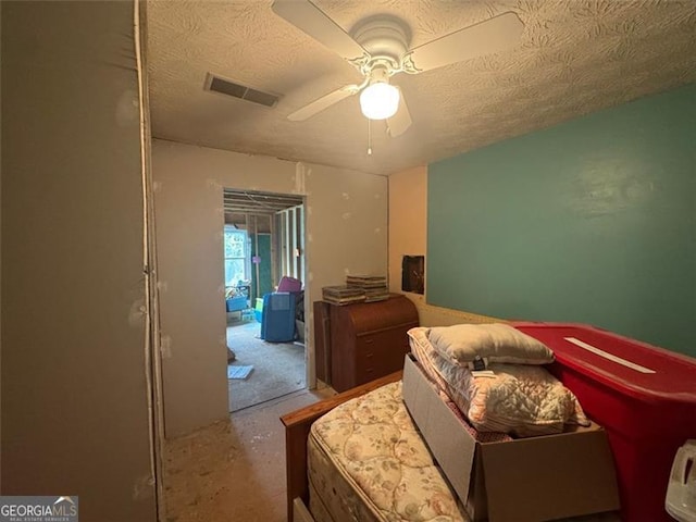 713 Pine Chase, Lawrenceville, GA 30043 - bedroom featuring ceiling fan and a textured ceiling