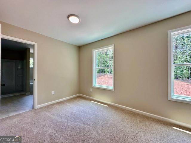 202 Lakeside Dr Lot 73, Lagrange, GA 30240 - carpeted spare room with healthy amount of natural light