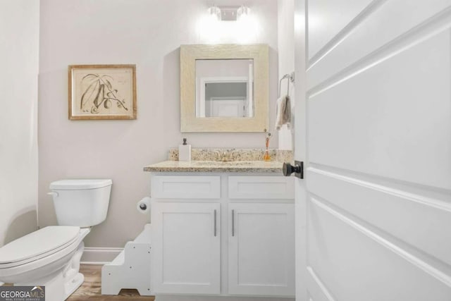 2326 Britt St, Grayson, GA 30017 - half bath featuring vanity and toilet