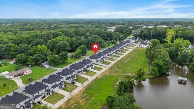 2326 Britt St, Grayson, GA 30017 - aerial perspective of suburban area with a large body of water and a heavily wooded area