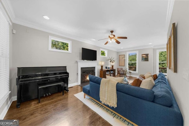 2653 W Main St NW, Atlanta, GA 30318 - living area with ceiling fan, recessed lighting, crown molding, a lit fireplace, and wood finished floors