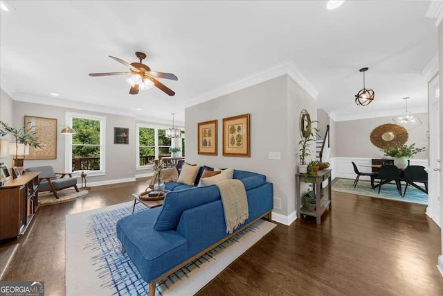 2653 W Main St NW, Atlanta, GA 30318 - living room featuring a chandelier, dark wood-type flooring, crown molding, and ceiling fan