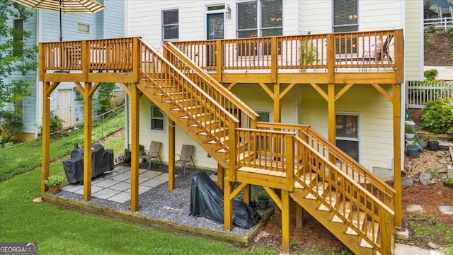 2653 W Main St NW, Atlanta, GA 30318 - rear view of house featuring stairway, a deck, and a patio