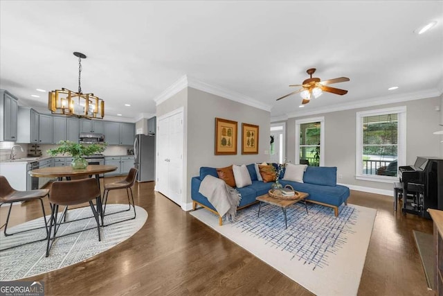 2653 W Main St NW, Atlanta, GA 30318 - living area with ceiling fan, recessed lighting, dark wood-style floors, a chandelier, and crown molding
