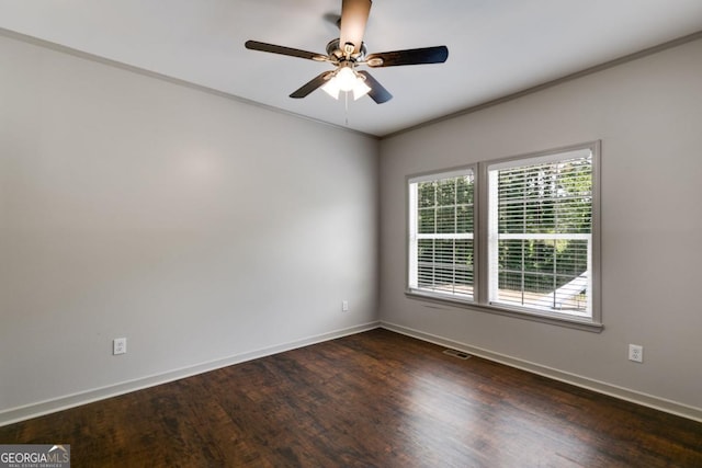 370 Simms Rd, Carrollton, GA 30117 - spare room featuring dark wood-type flooring, crown molding, and ceiling fan