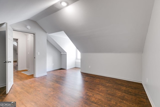 370 Simms Rd, Carrollton, GA 30117 - additional living space featuring vaulted ceiling and wood finished floors