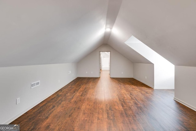 370 Simms Rd, Carrollton, GA 30117 - bonus room featuring lofted ceiling and dark wood-type flooring
