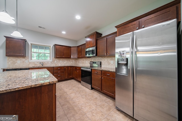 38 Pin Oak Way, Hamilton, GA 31811 - kitchen featuring stainless steel appliances, light stone counters, tasteful backsplash, and recessed lighting