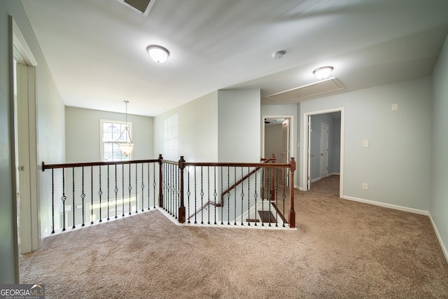 38 Pin Oak Way, Hamilton, GA 31811 - hallway with attic access, carpet flooring, and an upstairs landing