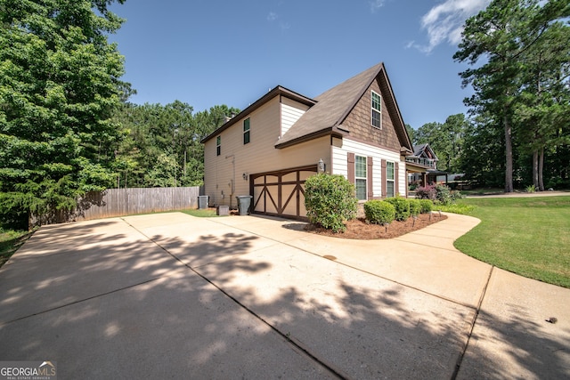 38 Pin Oak Way, Hamilton, GA 31811 - view of home's exterior featuring a garage and driveway