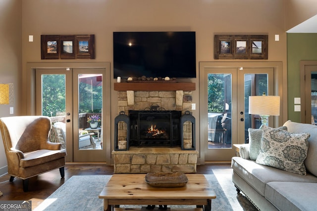 4 Bluff Ct SE, Cartersville, GA 30120 - living area featuring french doors, healthy amount of natural light, and wood finished floors