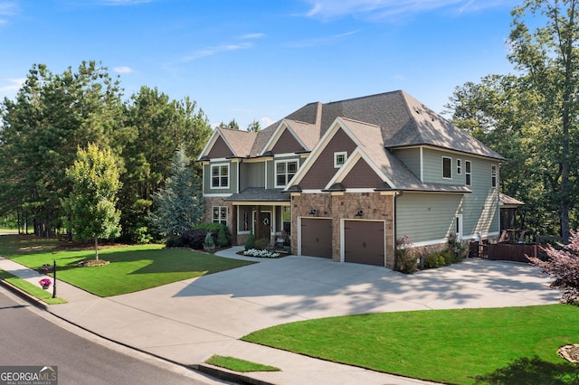 4 Bluff Ct SE, Cartersville, GA 30120 - craftsman inspired home featuring stone siding, driveway, a front yard, a shingled roof, and a garage