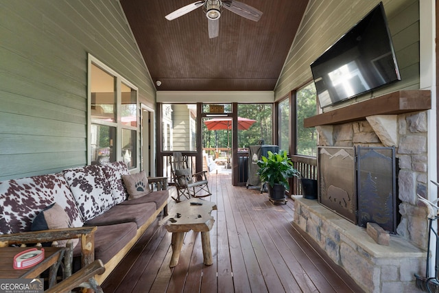 4 Bluff Ct SE, Cartersville, GA 30120 - sunroom / solarium featuring ceiling fan, a stone fireplace, and vaulted ceiling