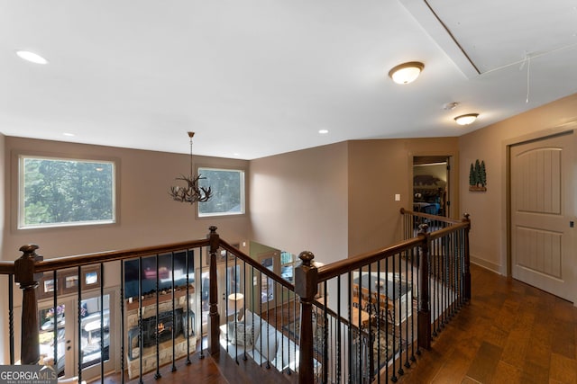 4 Bluff Ct SE, Cartersville, GA 30120 - corridor with attic access, an upstairs landing, wood finished floors, a chandelier, and recessed lighting
