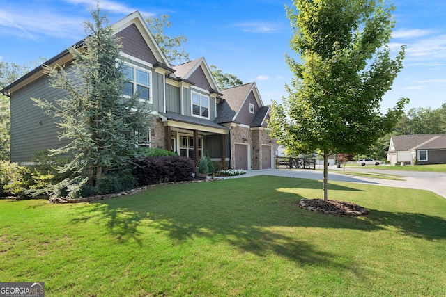 4 Bluff Ct SE, Cartersville, GA 30120 - craftsman-style home with driveway, stone siding, a front yard, and an attached garage